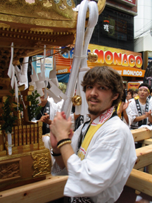 Tony Raymond takes part in a street festival in Japan