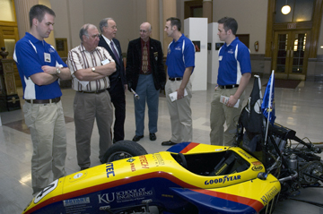 Jayhawk Motorsports team members engage visitors