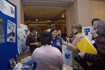 Visitors crowd around the School of Engineering table at KU in the Capitol in March 2008.