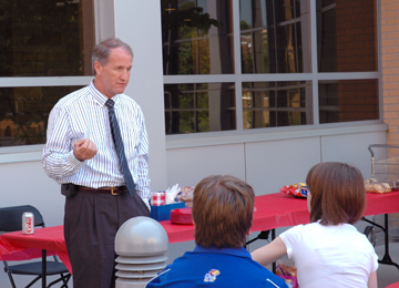 Dean Stuart R. Bell meets with incoming freshmen during a summer cookout at the KU School of Engineering.