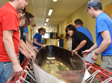University of Kansas School Engineering students participating in the American Society of Civil Engineers (ASCE) concrete canoe competition