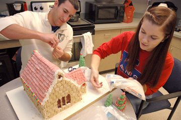 SELF students working on the gingerbread Danforth chapel
