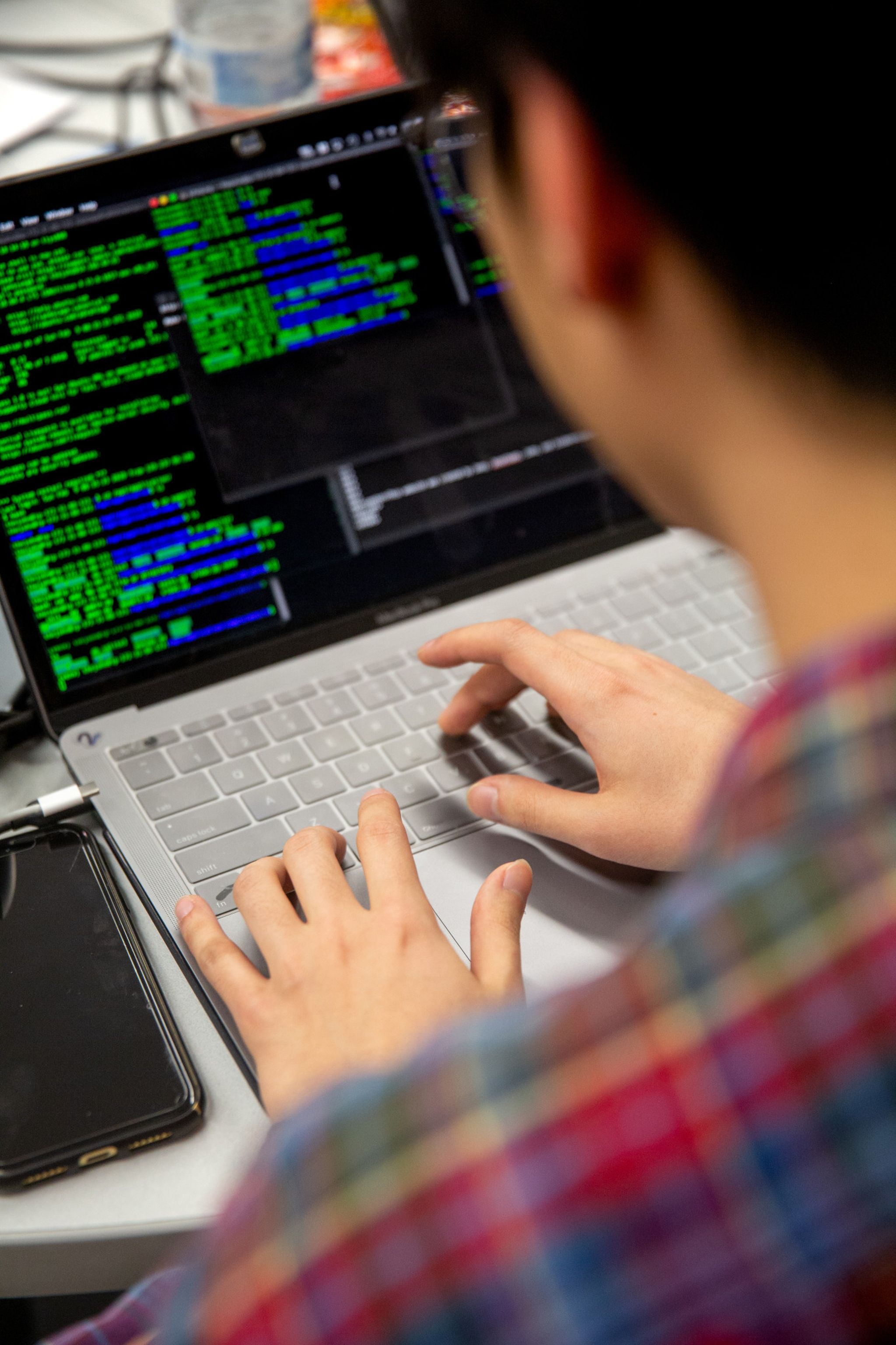 A student working on a hackathon