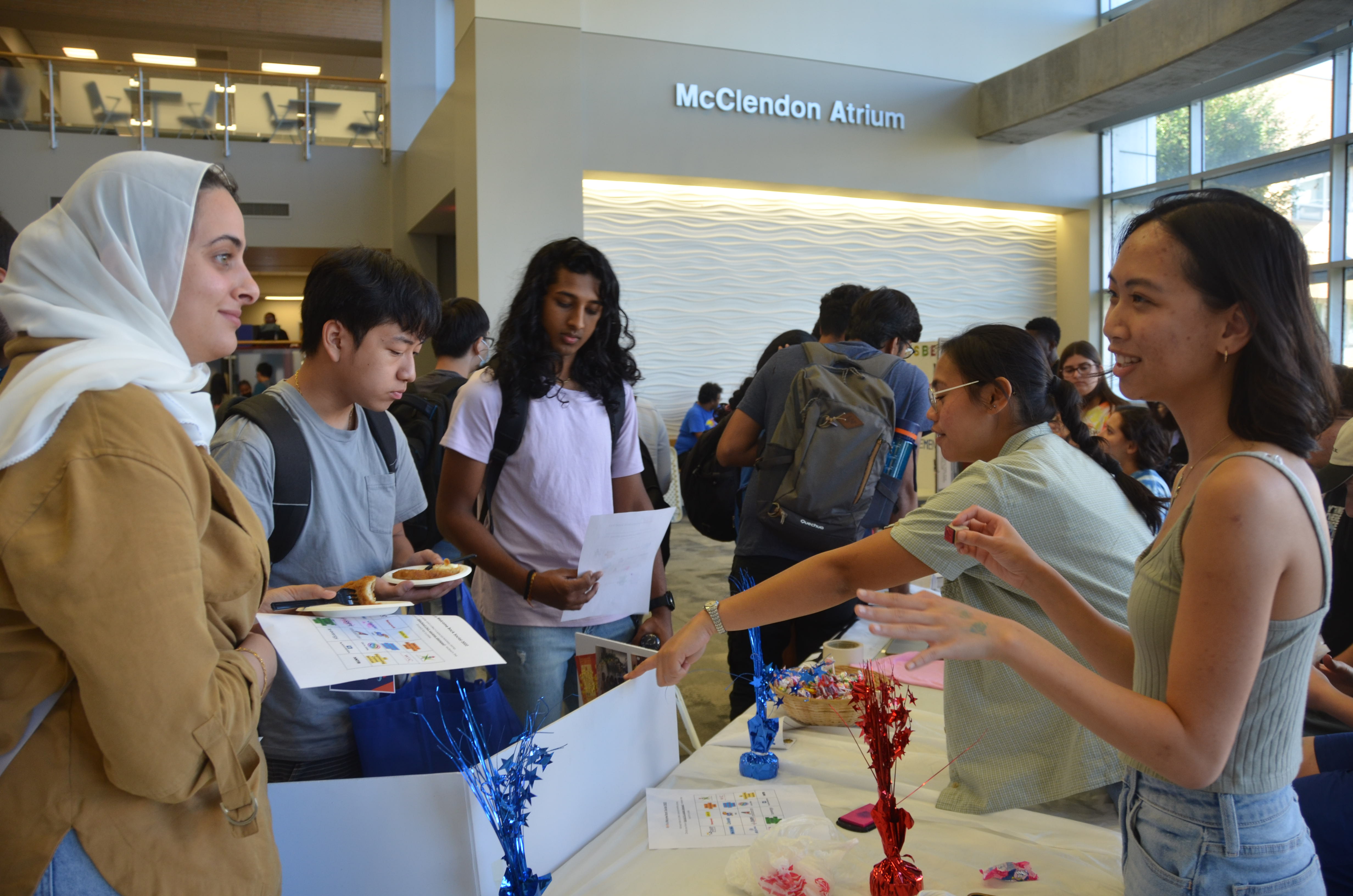 Students gather for a fair at the McClendon Atrium