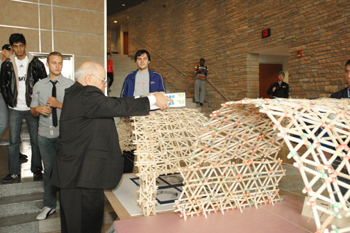 Architectural engineering freshmen have their first project put to the test. Project judging included being able to bear the load of two reams of paper. 
