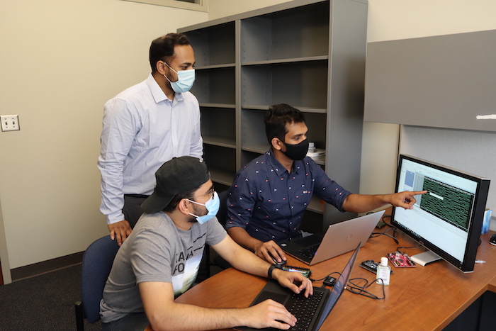 Tamzidul Hoque, assistant professor of electrical engineering & computer science, discusses a simulation of hardware attacks with his graduate and undergraduate mentees. Hogue will manage KU's portion of a $400,000 grant from the National Science Foundation to design course modules that train college students to build and maintain more secure computer hardware.