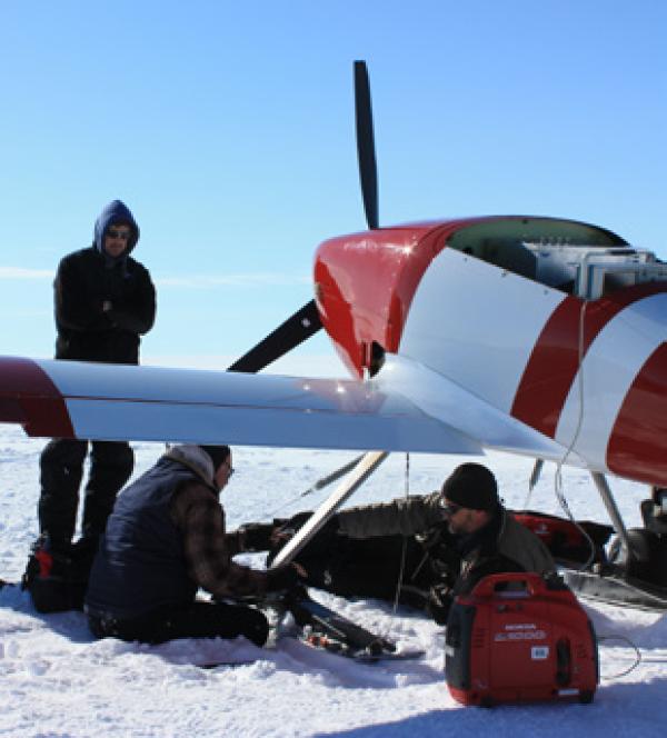 Working on a drone on an ice field