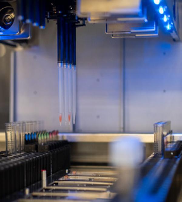 a machine for filling vials with droppers